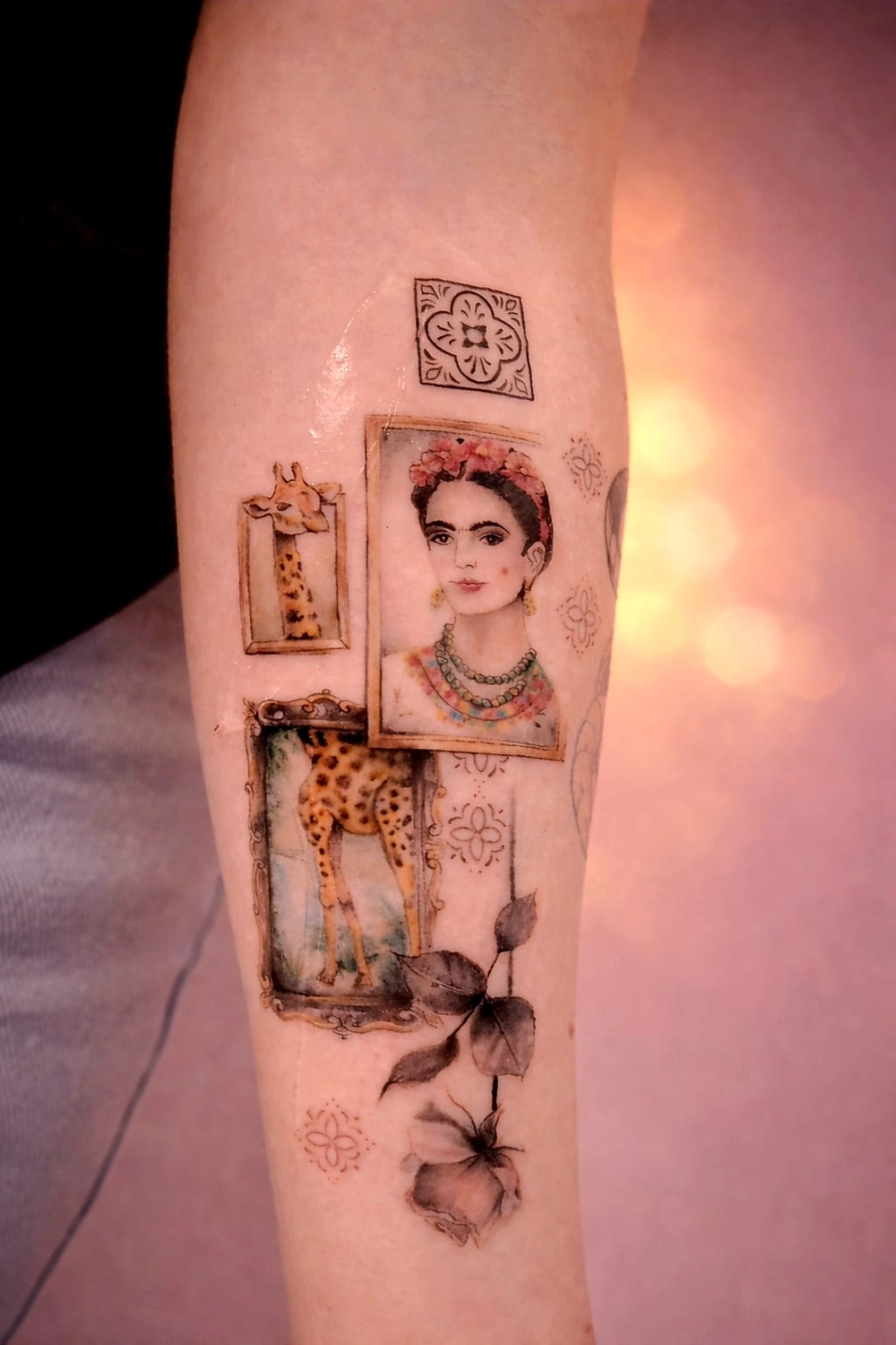 A Fleur de Peau - Professionelles Tattoo Studio - Tätowierung am Arm einer Person